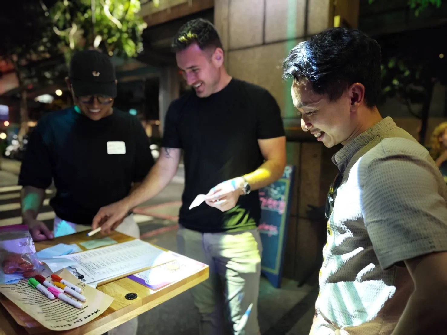 Guests gathered around a tabletop activity