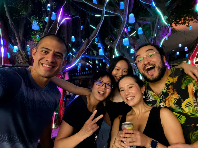 Friends posing together during a social evening