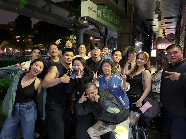 Saturday guests smiling together outside Tea Bar